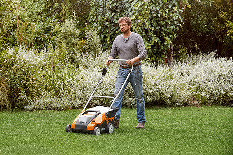 Petrol lawn mower with best sale scarifier attachment