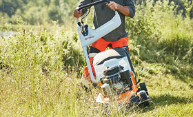 Petrol lawn mower for professional use