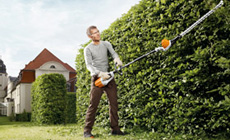 Cordless power systems extended length hedge trimmers